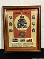 Framed set overview showing coins, RCMP emblem, and stamps