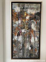 Front view of framed abstract painting showing overall composition and frame style