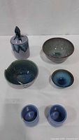 Group shot of all six glazed pottery pieces