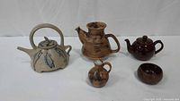 Group shot of five stoneware items
