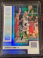 Front of Stephen Curry Symbols #8 holographic card in sleeve