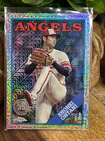 Front of Shohei Ohtani Topps Chrome Mojo card in sleeve and loader