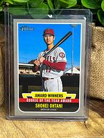 Front of Shohei Ohtani Topps Heritage Award Winners Rookie of the Year insert card in plastic sleeve