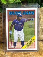 Front view of Vladimir Guerrero Jr Topps 70th Anniversary card inside plastic top-loader