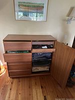 Front view with drawers and door open showing internal shelves