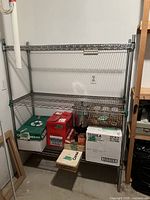 Full view of metal wire shelf with three tiers