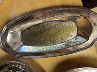 engraved silver-plated oval platter interior