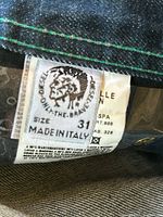 Diesel size 31 label showing brand, size, made in Italy