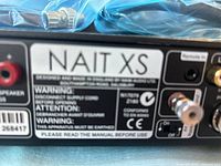 Rear panel showing NAIT XS model badge and serial 268417