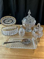 All seven pieces arranged on table