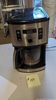 Full front view of Cuisinart coffee maker with carafe