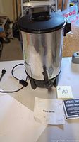 Stainless steel West Bend Party Perk urn with cord and manuals