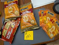 Group shot showing two HotHands value packs, Grabber pack and six individual HotHands packets