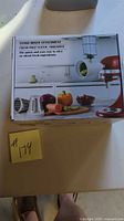 Front of box showing KitchenAid Fresh Prep Slicer/Shredder Attachment imagery