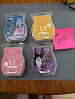 All four Scentsy wax bars displayed front labels visible