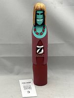 Front view showing overall design, colors, signature card for scale