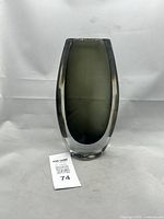 Front view of gray-within-clear crystal vase