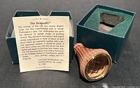 Dragonfly wooden kaleidoscope prism viewer with original green box and instruction card explaining the concept and patent details.