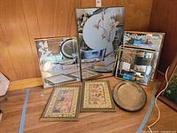 All items grouped: four mirrors, two framed prints, metal plate