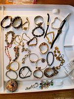 Tray overview showing all jewelry and watches