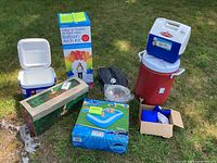 Full lot view showing all items grouped on grass