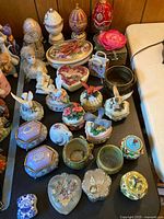 Overall group of trinket boxes on table