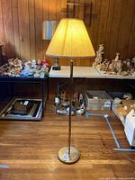 Full view of floor lamp with shade