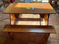 front view of table and bench showing overall design