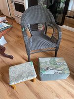 Front view showing armchair and both footstools