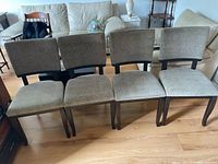 Front view of four dining chairs side by side