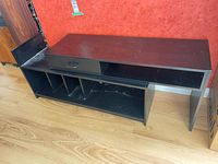 Front view of stacked media shelving showing drawer, shelves, LP compartments