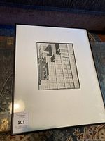 Framed architectural photograph as viewed from a distance, showing overall condition and framing