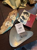 Set of three catch all trays displayed on table showing the different styles and shapes.