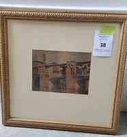 Full view of framed watercolor depicting a Florence cityscape