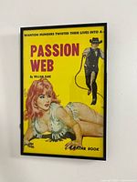 Framed pulp poster with vibrant yellow background and western-themed illustration featuring a cowboy and a woman.