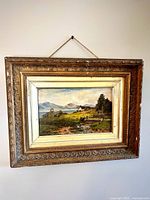 Frontal view of framed oil painting showing artwork and frame