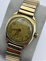 Front view of Gruen wristwatch showing dial, crystal, and bracelet