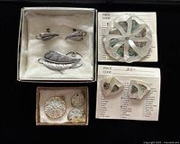 Overview of all jewelry sets in boxes