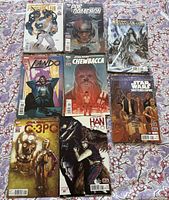 Eight different Star Wars character comics laid out