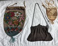 Front view of all three purses showing designs and sizes