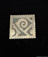 Front view of sterling Taxco square brooch showing design and condition