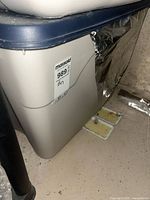 front view of grey plastic tote