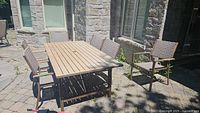 Patio dining set view highlighting six matching chairs around table