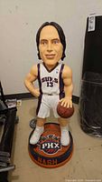 Front view of Steve Nash 36" statue with basketball on PHX base