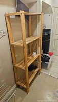 Full front view of the wood shelving unit