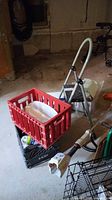 Overall view showing step stool, crates, part of trimmer and other items