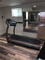 Side view of AFG treadmill showing frame and belt