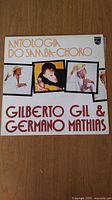 Front cover of Gilberto Gil & Germano Mathias LP 'Antologia do Samba-Choro' showing artist photos and album title.