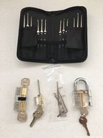 Full set showing lock pick case open, three practice locks and extractor tools