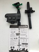 Full kit laid out showing sensor head, stake extension, instruction sheet